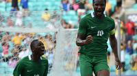 Reaksi Kapten Nigeria, John Obi Mikel (kanan), usai mencetak gol ke gawang Denmark, pada babak perempat final cabang sepak bola Olimpiade Rio 2016, di Arena Fonte Nova, Salvador, Brasil, Minggu (14/8/2016) dini hari WIB. Nigeria unggul 2-0, dan melaju ke 