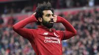 6.Mohamed Salah (Liverpool) - Salah mencatatkan rekor sebagai pemain dengan gol terbanyak dalam 100 penampilan bersama Liverpool. Bukan tidak mungkin, Salah menjadi calon kuat peraih gelar top skor di Liga Champions musim ini. (AFP/Paul Ellis)