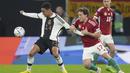 Pemain Hungaria, Callum Styles berusaha merebut bola dari pemain Jerman, Jamal Musala selama pertandingan UEFA Nations League di Red Bull Arena di Leipzig, Jerman, Jumat, 23 September 2022. Hungaria bertahan di puncak dengan 10 poin, unggul dua poin dari Italia yang baru saja mengalahkan Inggris 1-0. (AP Photo/Michael Sohn)