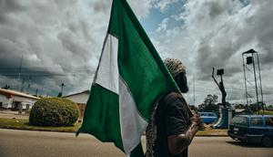 Ilustrasi bendera Nigeria. (Unsplash/Emmanuel Ikwuegbu)