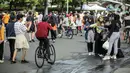 Warga berolahraga saat car free day di kawasan Bundaran HI, Jakarta, Minggu (4/12/2022). Penurunan kasus positif COVID-19 di Indonesia sudah mulai terlihat dalam sepekan belakangan. (Liputan6.com/Faizal Fanani)