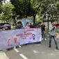 Lingkar Pemuda Indonesia (LPI) mengadakan aksi orasi dan konferensi pers untuk meminta Ketua Umum PDIP Megawati Soekarnoputri menyatukan Ganjar Pranowo dan Prabowo Subianto pada Pemilihan Presiden atau Pilpres 2024. (Liputan6.com/Rifqy Alief Abiyya)
