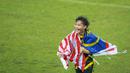 Pemain Timnas Malaysia U-19, Muhammad Haiqal, melakukan selebrasi usai menjuarai Piala AFF U-19 2022 di Stadion Patriot Chandrabhaga, Bekasi, Jumat (15/7/2022). (Bola.com/Bagaskara Lazuardi)