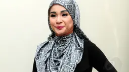 Wanita kelahiran 11 Juni 1986 ini mengaku mengenakan hijab ini sejak melahirkan buah hati. (17/6/14) (Liputan6.com/Panji Diksana)