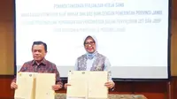 Ki-ka: Gubernur Jambi Al Haris dan Kepala BPH Migas Erika Retnowati usai melakukan Penandatanganan Perjanjian Kerja Sama (PKS) antara BPH Migas dan Pemprov Jambi di Jakarta, Rabu (17/7)/Istimewa.