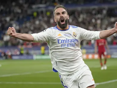 Dani Carvajal sempat dibuat kerepotan barisan penyerang Liverpool. Namun di babak kedua ia mampu mengatasi tekanan dan sesekali maju membantu serangan. (AP/Kirsty Wigglesworth)