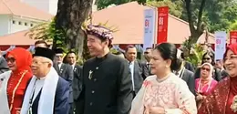 Di upacara 17 Agustus 2026, Iriana Jokowi tampil serba merah putih dengan Chanel Mini Flap ber-manik. (@jokowi)