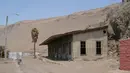 Stasiun kereta api yang terlantar di Pisagua, Humberstone, Chile. di Gurun Atacama ini pernah menjadi tempat tinggal bagi 3.500 jiwa dan menjadi Pusat pertambangan nitrat. (REUTERS/Wikimedia Commons)