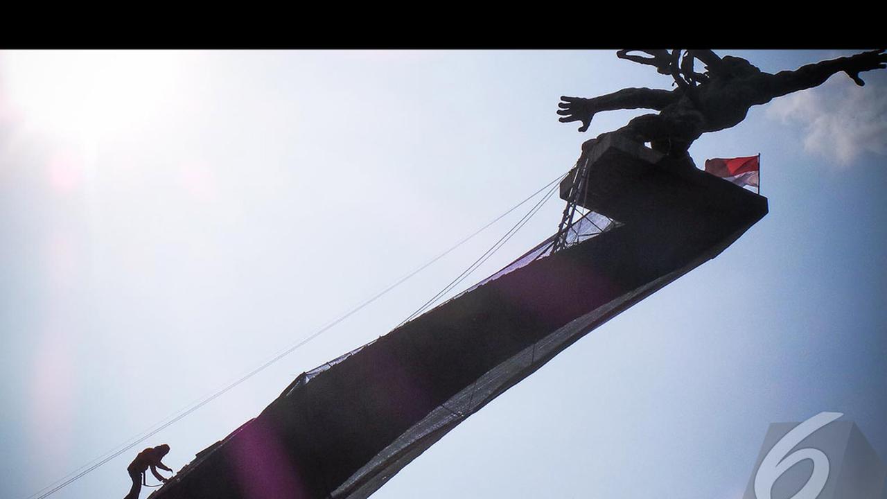 Patung Pancoran Akan Mandi Air Jeruk Nipis