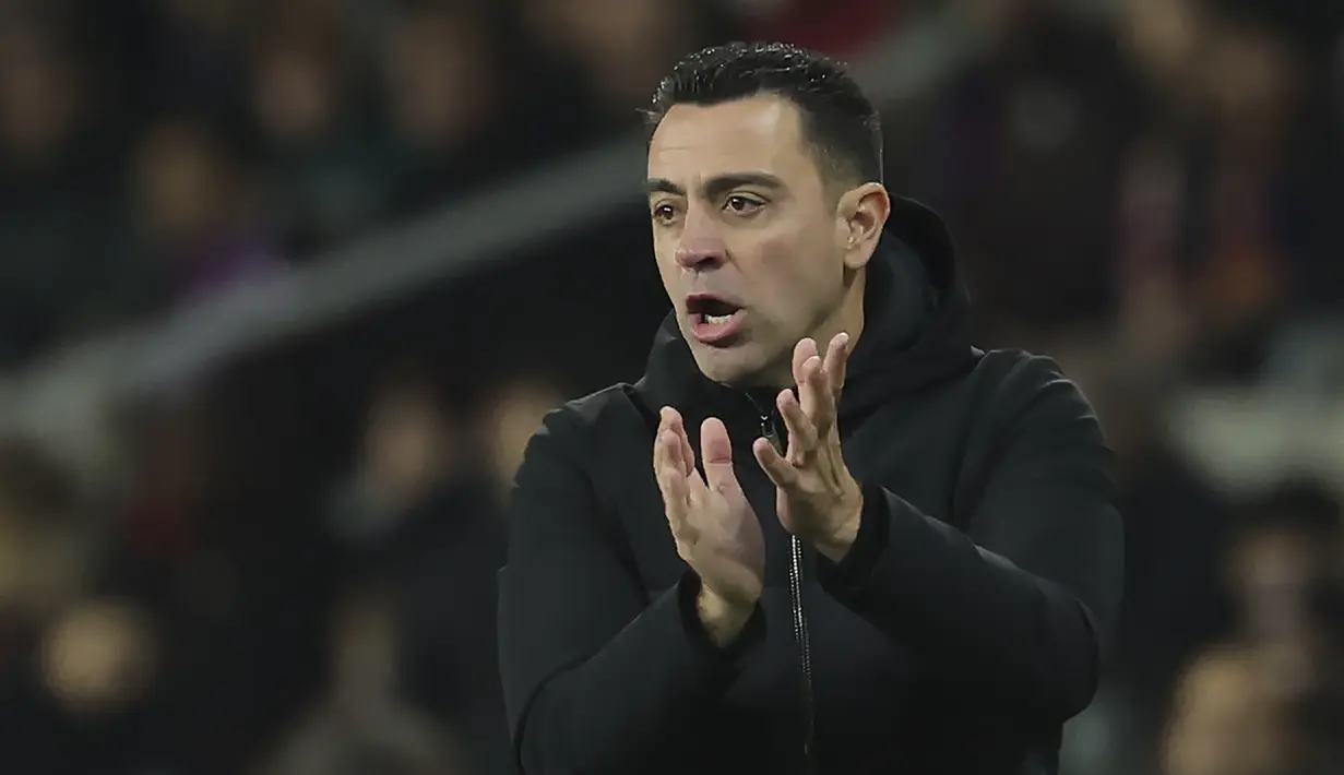 Setelah pembicaraan lebih lanjut dengan petinggi Barcelona, Xavi memutuskan pada 25 April 2024 untuk bertahan hingga masa kerjanya berakhir. (LLUIS GENE / AFP)