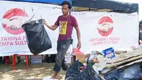 Ini Cara Posko Pertamina Peduli Ajak Masyarakat Palu Bersihkan Lokasi Bencana