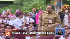 Tinjau hari pertama sekolah, Anies Baswedan disambut pantun oleh seorang siswa di SDN Kampung Melayu 01 Pagi.