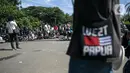 Massa yang tergabung dalam Aliansi Mahasiswa Papua (AMP) menggelar aksi di kawasan Patung Kuda, Jakarta, Selasa (1/12/2020). AMP menyerukan kepada dunia internasional untuk membangun konsolidasi solidaritas perjuangan hak menentukan nasib sendiri bagi bangsa West Papua. (Liputan6.com/Faizal Fanani)