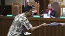 Terdakwa kasus dugaan suap jual beli jabatan di lingkungan Kemenag, M Romahurmuziy saat menjalani sidang lanjutan di Pengadilan Tipikor, Jakarta, Senin (23/9/2019). Sidang beragendakan pembacaan eksepsi yang dibacakan terdakwa dan penasehat hukum terdakwa. (Liputan6.com/Helmi Fithriansyah)