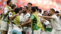 Kemenangan susah payah diraih timnas Iran usai mengalahkan timnas Wales dengan skor 2-0 yang dicetak pada waktu injury time. (AP Photo/Francisco Seco)