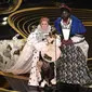 Melissa McCarthy dan Brian Tyree Henry di Oscar 2019 (Photo by Chris Pizzello/Invision/AP)