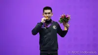 Harris Horatius berhasil meraih medali emas Asian Games 2022 dari cabang olahraga wushu. Bertanding di&nbsp;XSG Sports Centre Taolu, Selasa (26/9/2023) siang WIB, Harris menjadi yang terbaik di nomor&nbsp;Nanquan/Nangun. (dok. NOC Indonesia)