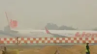 Sejumlah bandara di Sumatera lumpuh akibat tebalnya kabut asap, hingga puluhan orang tertipu penjualan tiket konser grup rock Bon Jovi.