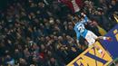 Pemain Napoli, Lorenzo Insigne merayakan golnya ke gawang AM Milan pada pertandingan Serie A pekan ke-26 di San Paolo, Naples, Selasa (23/2/2016) dini hari WIB. (AFP/Carlo Hermann)