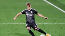 Pemain Real Madrid, Martin Odegaard. (JOSE JORDAN / AFP)