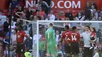 Pemain Manchester United (MU) usai menghadapi Cardiff City pada laga terakhir Liga Inggris di Old Trafford, Minggu (12/5/2019). (AP Photo / Rui Vieira)