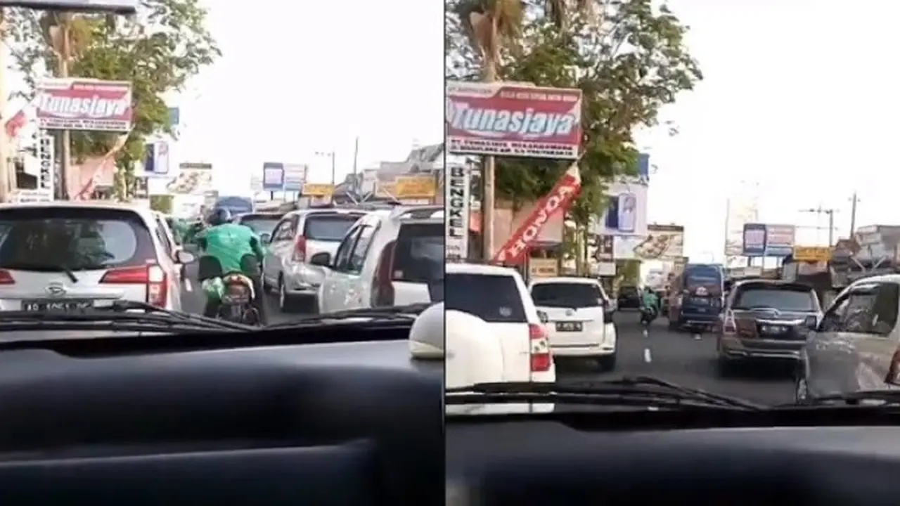 driver ojol bantu buka jalan ambulans (foto: Twitter/@aratiararismala)