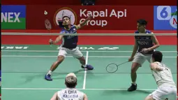 Pram/Yere menyerah lewat pertandingan rubber game. Mereka kalah 21-12, 21-23, dan 13-21. (Liputan6.com/Herman Zakharia)