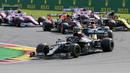 Pembalap Mercedes, Lewis Hamilton, memimpin di balapan F1 GP Belgia di Sirkuit Spa-Francorchamps, Minggu (30/8/2020). Lewis Hamilton finis pertama dengan catatan waktu 1 jam 24 menit 8,761 detik. (Stephanie Lecocq, Pool via AP)