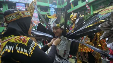 Sejumlah pelajar sekolah BPS&K Jakarta bersiap melakukan karnaval, Sabtu (31/8/2024). (merdeka.com/Imam Buhori)