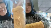 Viral Emak-Emak Pakai Gelang Emas Raksasa, Bak Sarung Tangan Thanos (Sumber: Instagram/dunia_kaumhawa)