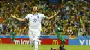 Selebrasi pemain Yunani, Andreas Samaris, usai mencetak gol ke gawang Pantai Gading di laga penutup penyisihan Piala Dunia 2014 Grup C di Stadion Castelao, Fortaleza, Brasil, (25/6/2014). (REUTERS/Marcelo Del Pozo)