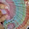 Rupiah Menguat ke 17.715 per Dolar AS, Investor Tunggu Data Inflasi