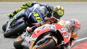 Valentino Rossi dan Marc Marquez (c) AFP