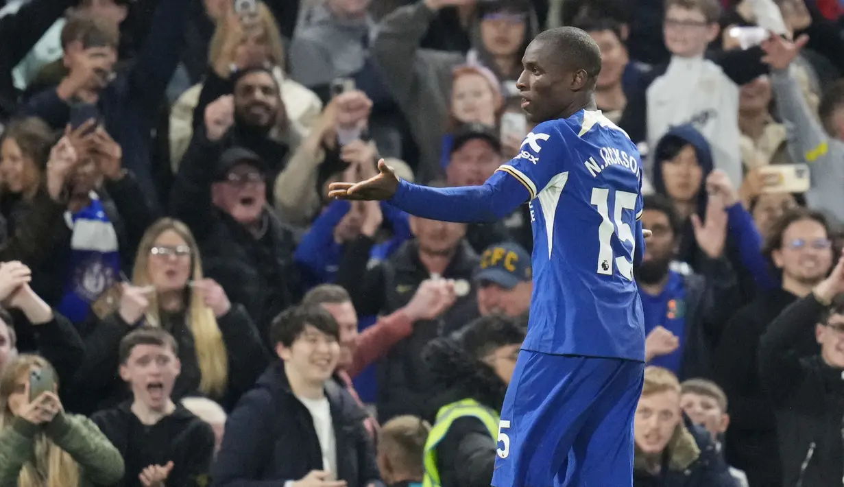 Nicolas Jackson dari Chelsea menari usai mencetak gol ke gawang Tottenham Hotspur pada laga Liga Inggris di Stadion Stamford Bridge, Jumat (3/4/2024).  (Foto AP/Kirsty Wigglesworth)