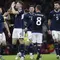 Para pemain Timnas Skotlandia merayakan gol yang dicetak Scott McTominay ke gawang Spanyol pada laga Grup A Kualifikasi Euro 2024 di Hampden Park Stadium, Glasgow, Skotlandia (28/3/2023). Skotlandia total mengoleksi 5 gol tanpa kebobolan di Grup A. Scott McTominay dkk sukses menghajar Siprus 3-0 dan Spanyol 2-0. (AP Photo/Scott Heppell)