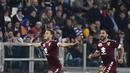 Striker Torino, Adem Ljajic, melakukan selebrasi usai mencetak gol ke gawang Juventus. Hasil imbang ini membuat Juventus harus menunda pesta gelar Scudetto karena poin mereka masih bisa terkejar oleh Napoli dan AS Roma. (AFP/Miguel Medina)