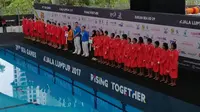 Tim nasional Polo air putri Indonesia takluk dari musuh bebuyutan Singapura dengan skor tipis 6-7 dalam laga perdana SEA Games 2017, Selasa (15/8/2017). (KOI)