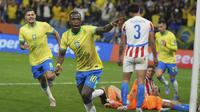 Pemain Brasil Vinicius Junior merayakan gol timnya melawan Paraguay dalam pertandingan kualifikasi Piala Dunia 2026 di Neo Quimica Arena, Sao Paulo, Rabu, 11 Juni 2025. (AP Photo/Andre Penner)