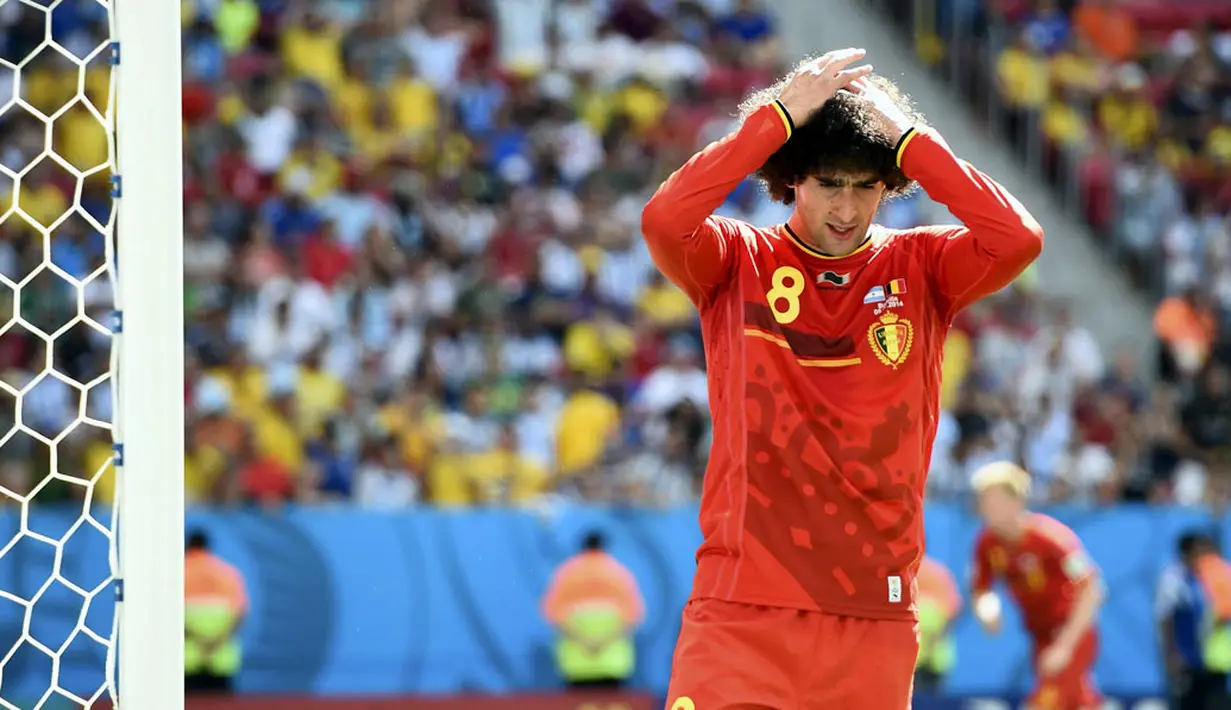 Ekspresi kekecewaan gelandang Belgia, Marouane Fellaini, saat gagal memanfaatkan peluang mencetak gol ke gawang Argentina di laga perempat final Piala Dunia 2014 di Stadion Nasional Brasilia, (5/7/2014). (REUTERS/Dylan Martinez) 