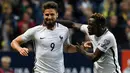 Striker Prancis, Olivier Giroud, merayakan gol yang dicetaknya ke gawang Swedia pada laga kualifikasi Piala Dunia 2018 di Stadion Friends Arena, Solna, Jumat (9/6/2017). Swedia menang 2-1 atas Prancis. (AFP/Franck Fife)