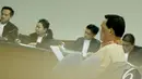 Mantan Wakil Kepala Korps Lalu Lintas Polri Brigjen Pol Didik Purnomo menjalani sidang perdana dengan agenda pembacaan dakwaan oleh jaksa penuntut umum (JPU) di Pengadilan Tipikor, Jakarta, Kamis (11/12/2014). (Liputan6.com/Andrian M Tunay)
