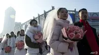 Nikah Massal hingga Berenang di Kolam Dingin, Meriahnya Festival Es Harbin