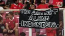 Pendukung timnas Indonesia saat menyaksikan laga kualifikasi Grup A Piala AFF 2022 antara Indonesia melawan Kamboja di di Stadion Utama Gelora Bung Karno, Jakarta, Jumat (23/12/2022). Indonesia unggul 2-1 atas Kamboja lewat gol yang dicetak Egy Maulana Vikry dan Witan Sulaeman. (Liputan6.com/Helmi Fithriansyah)