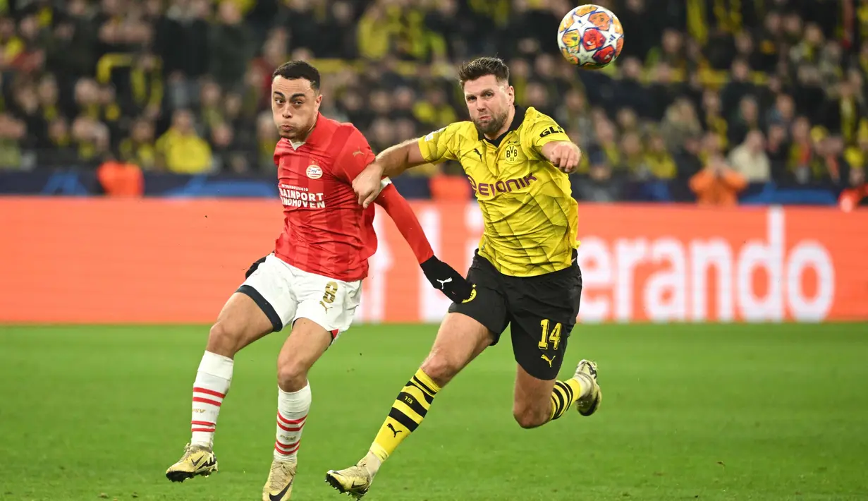 Kemenangan ini membuat Die Borussen unggul agregat gol 3-1 setelah kedua tim bermain imbang 1-1 pada leg pertama. (INA FASSBENDER/AFP)