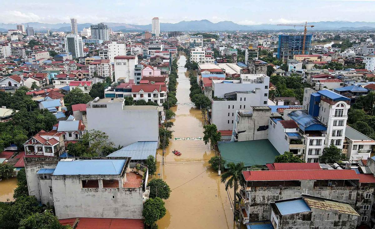 FOTO: Topan Matmo Luluhlantakkan Vietnam Utara, Banjir Terburuk dalam 60 Tahun