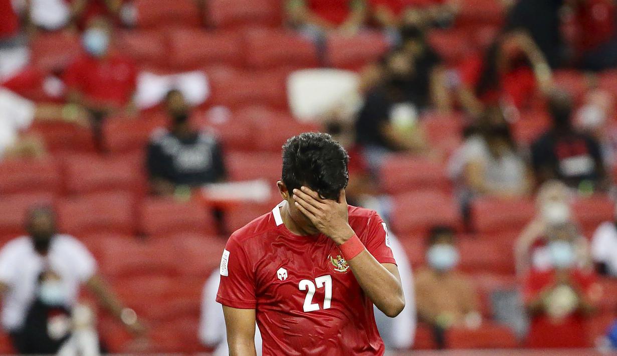 Timnas Indonesia harus mengakui ketangguhan Thailand pada leg pertama final Piala AFF 2020. Skuad Garuda babak belur dihajar Thailand empat gol tanpa balas di Stadion Nasional, Kallang, Singapura, Rabu (29/12/2021). (AP/Suhaimi Abdullah)