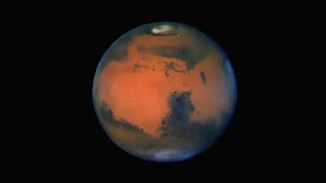 'Wajah' Planet Mars Terpampang Nyata dari Lensa Teleskop Hubble