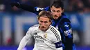 Di babak kedua, Real Madrid meningkatkan pola serangan permainan. (Marco BERTORELLO/AFP)
