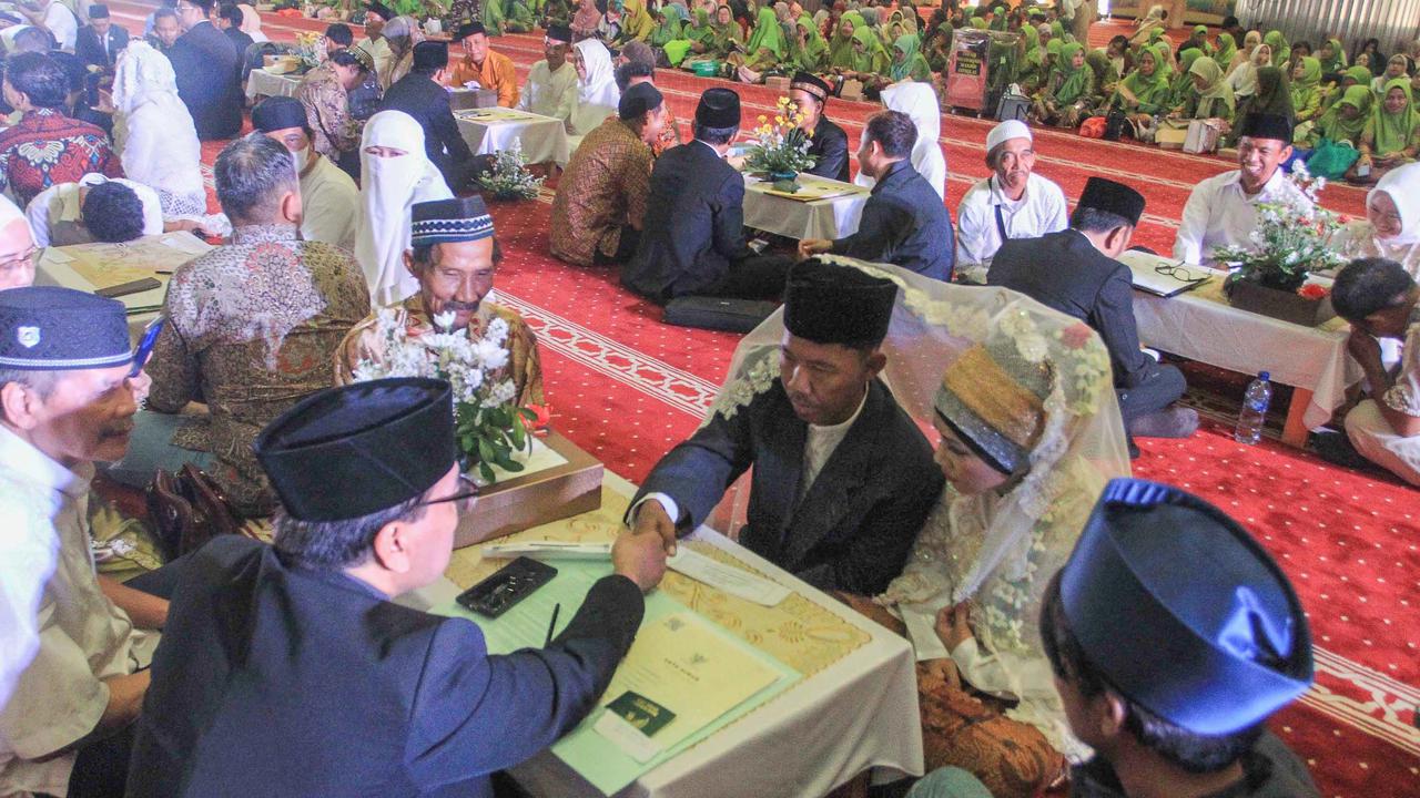 FOTO: 51 Pasangan Resmi Menikah Gratis di Masjid Istiqlal