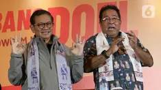 Calon gubernur dan wakil gubernur DKI Jakarta nomor urut 3, Pramono Anung (kiri) bersama Rano Karno saat menyampaikan keterangan terkait hasil hitung cepat pada Pemilihan Kepala Daerah (Pilkada) Serentak 2024 di Jakarta, Rabu (27/11/2024). (Liputan6.com/Herman Zakharia)
